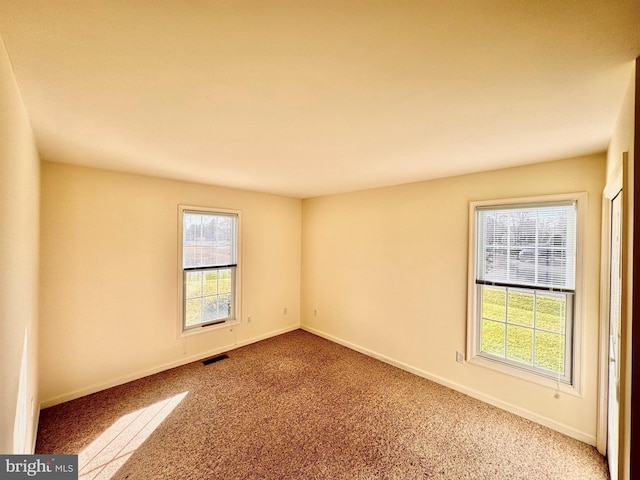 view of carpeted spare room