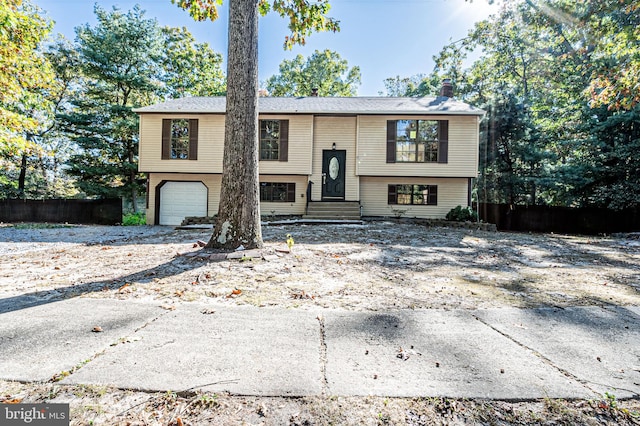 raised ranch with a garage