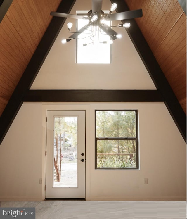 bonus room featuring vaulted ceiling with beams, an inviting chandelier, and wooden ceiling