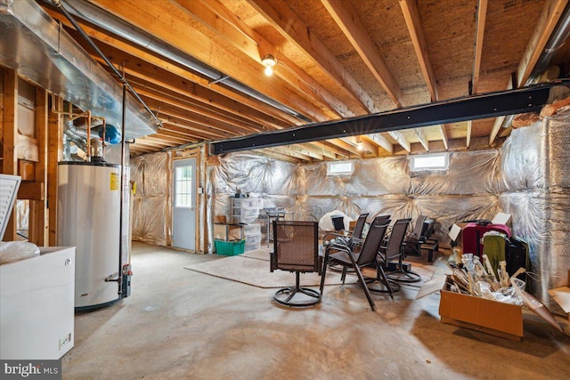 basement featuring water heater