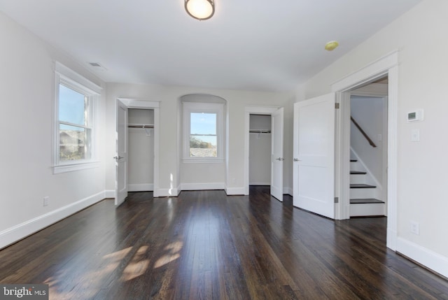 interior space featuring dark wood-type flooring