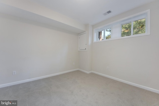 empty room featuring carpet flooring