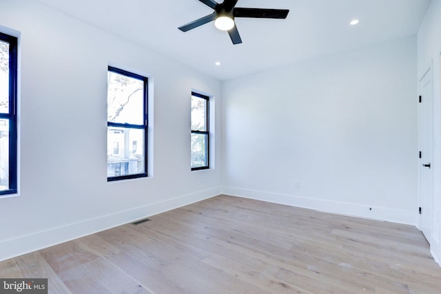 unfurnished room with light hardwood / wood-style floors and ceiling fan