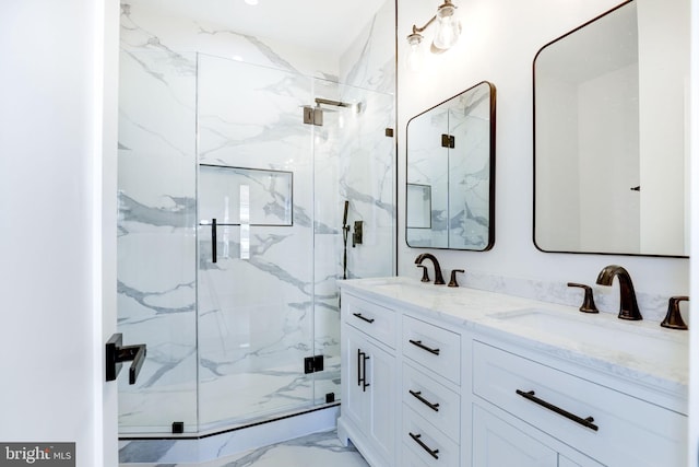 bathroom featuring vanity and an enclosed shower