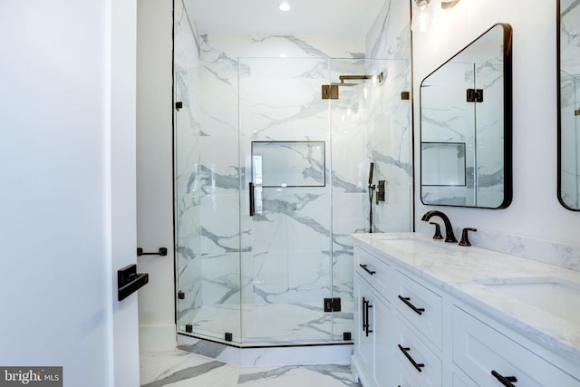 bathroom featuring vanity and an enclosed shower