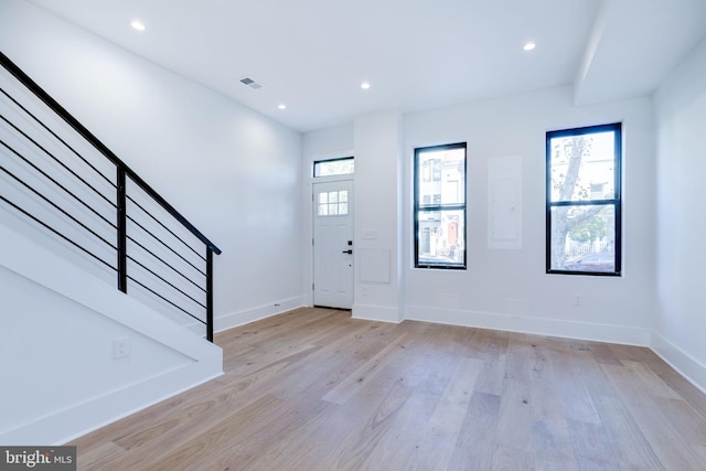 foyer entrance featuring light hardwood / wood-style flooring