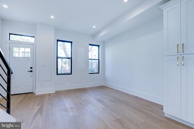 entryway with a healthy amount of sunlight and light wood-type flooring