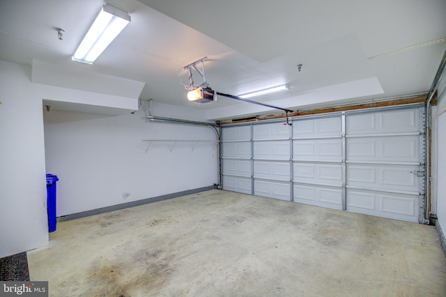 garage featuring a garage door opener