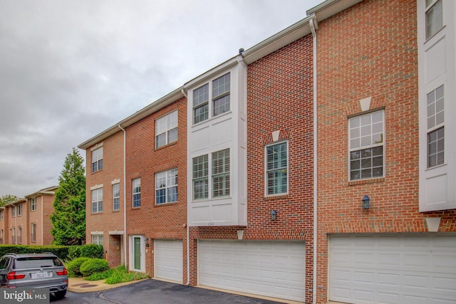 view of building exterior with a garage