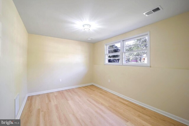 empty room featuring light hardwood / wood-style floors