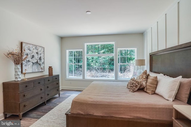 bedroom featuring dark wood-type flooring