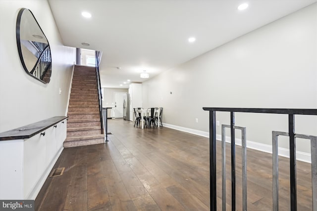 hall featuring dark hardwood / wood-style floors