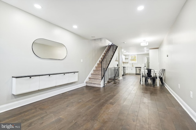 interior space with dark hardwood / wood-style flooring