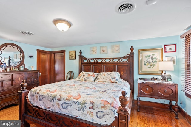 bedroom with light hardwood / wood-style floors