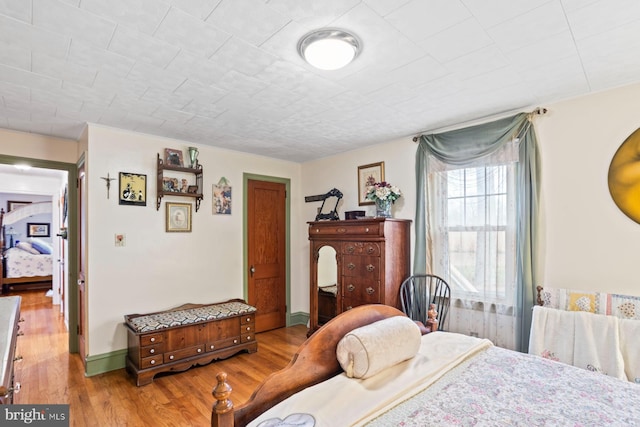 bedroom featuring light hardwood / wood-style floors