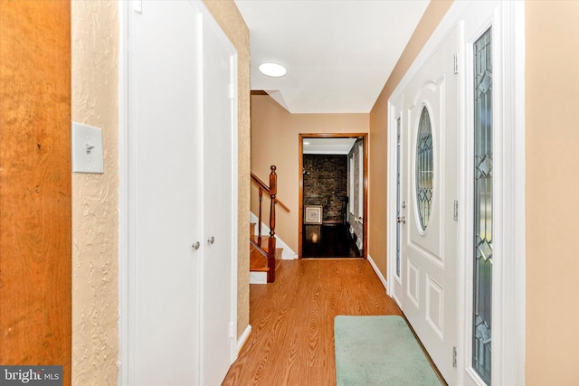 corridor featuring light hardwood / wood-style flooring