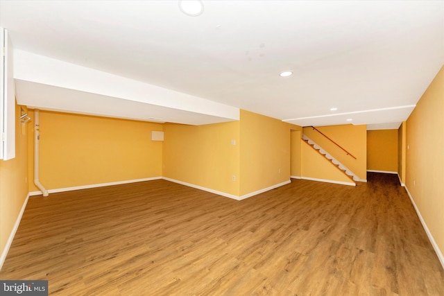 basement featuring wood-type flooring