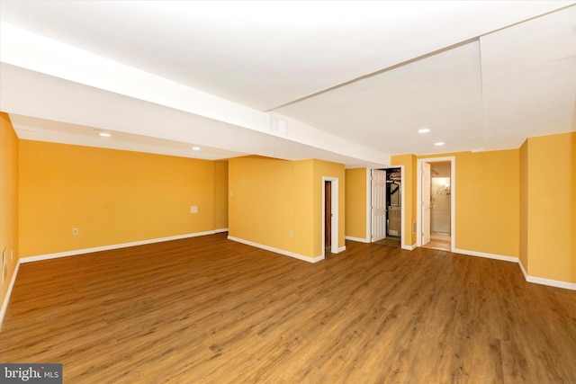 basement featuring hardwood / wood-style flooring