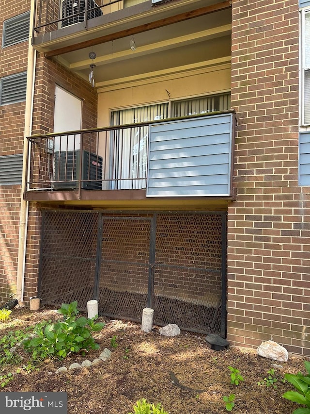 view of side of home with a balcony