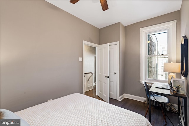 bedroom featuring dark hardwood / wood-style floors and ceiling fan