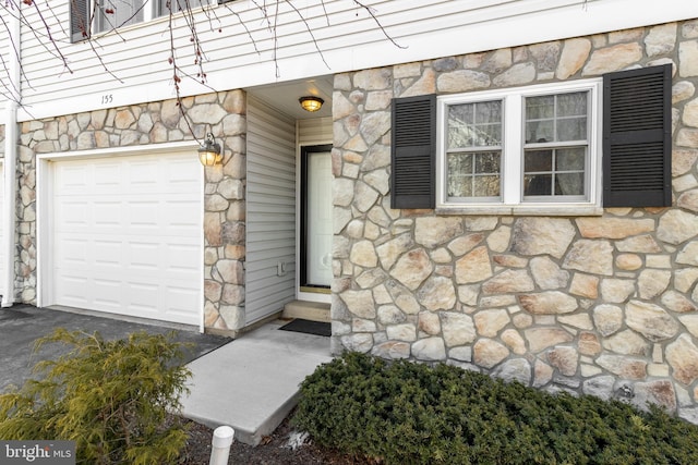 property entrance featuring a garage