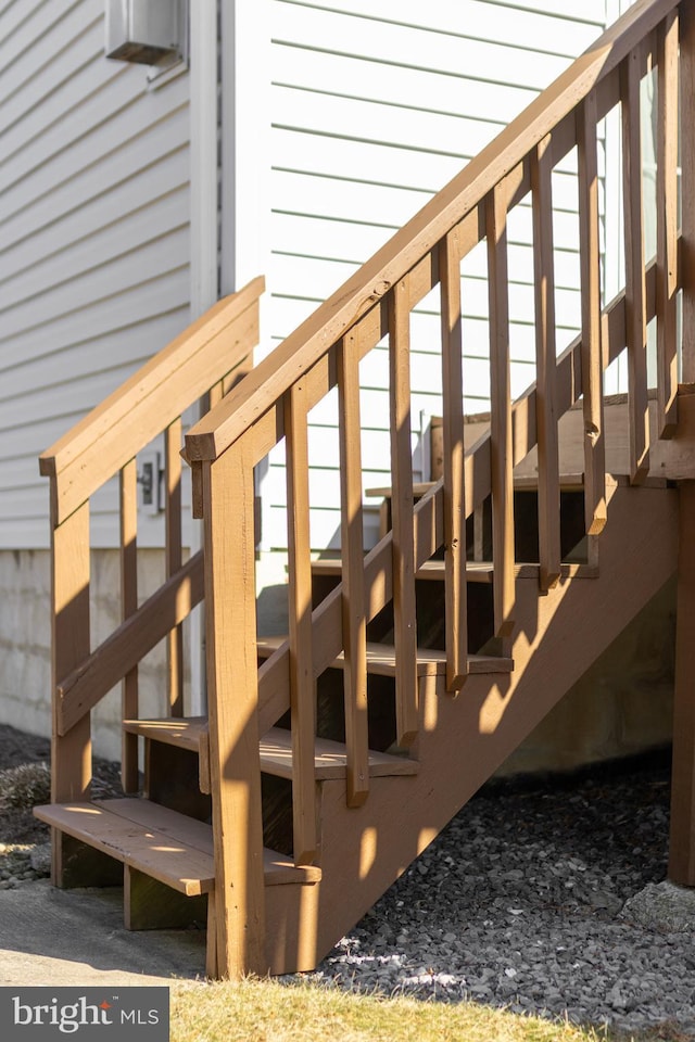 wooden deck featuring stairs