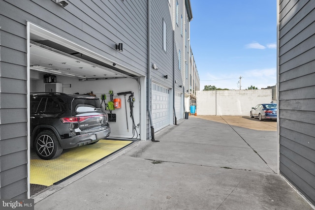 exterior space with a garage