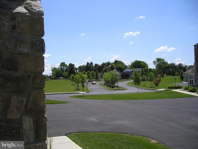 surrounding community with a lawn