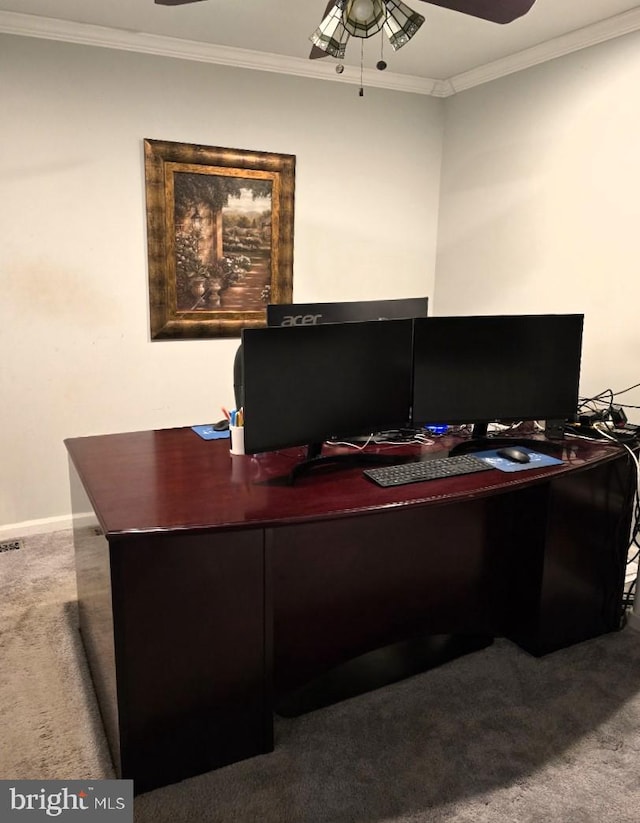 carpeted office featuring ceiling fan and ornamental molding