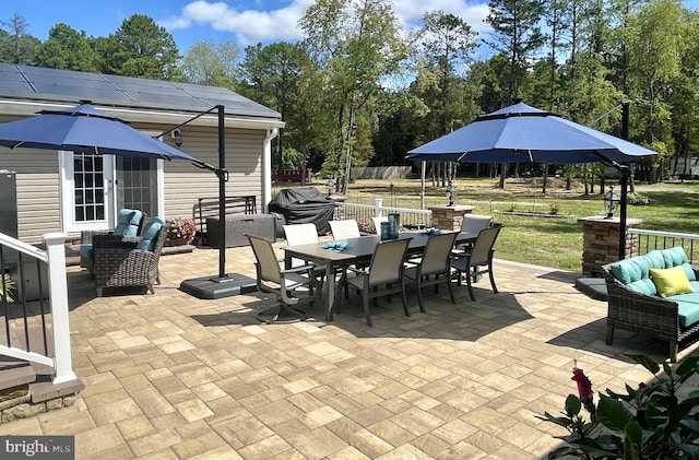 view of patio / terrace with grilling area and outdoor lounge area