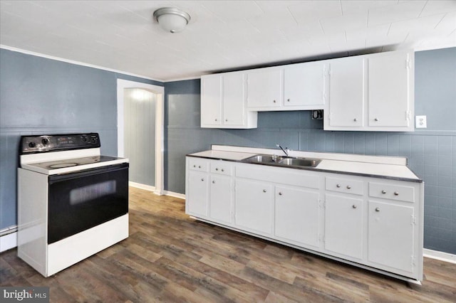 kitchen with white cabinetry, electric stove, sink, and dark hardwood / wood-style flooring