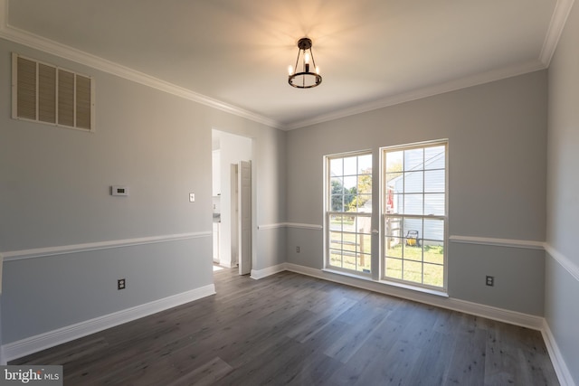 unfurnished room featuring ornamental molding and dark hardwood / wood-style flooring