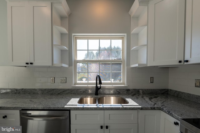 kitchen with white cabinetry, dishwasher, tasteful backsplash, and sink