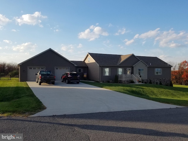 ranch-style home with a front yard and a garage