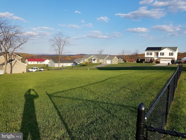 view of yard with a garage