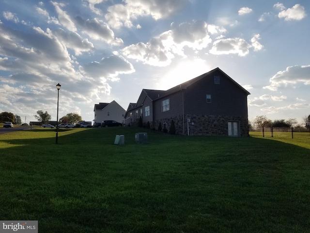 view of property exterior featuring a yard