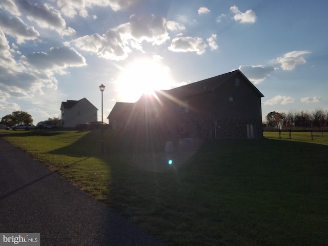 view of property exterior featuring a yard