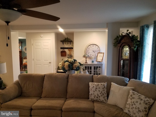 living room featuring ceiling fan