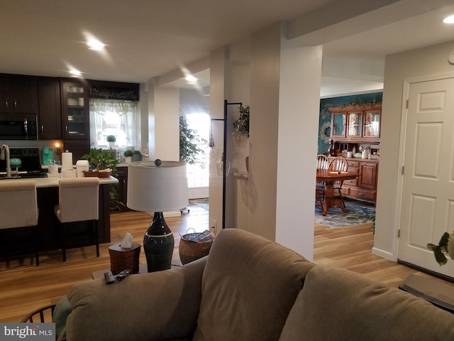 living room featuring light wood-type flooring