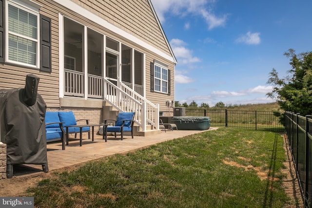 view of yard with a patio area, central AC unit, and a sunroom