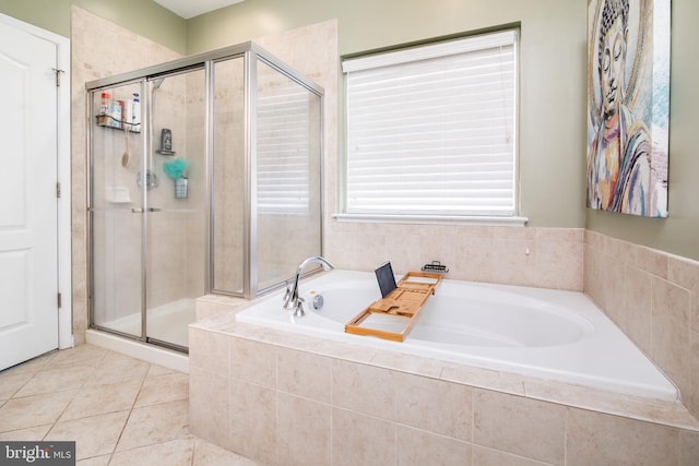 bathroom with plus walk in shower and tile patterned flooring