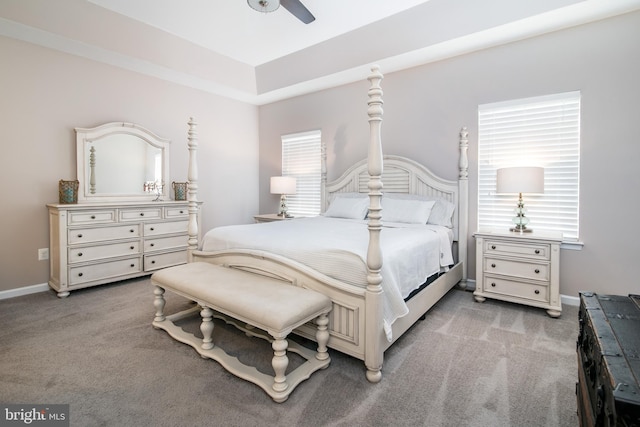 bedroom featuring light carpet and ceiling fan