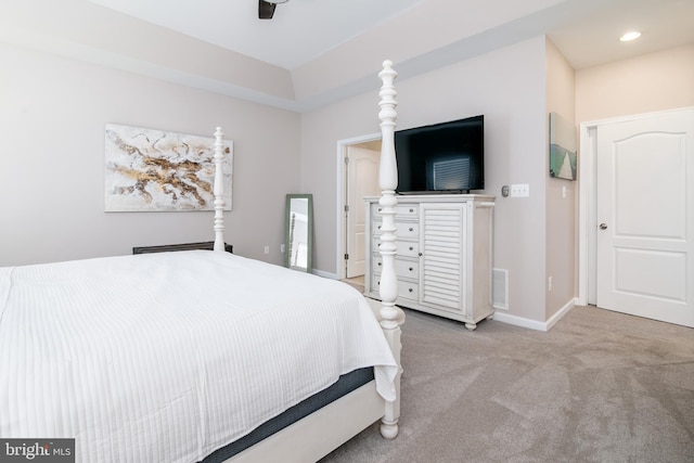 bedroom featuring light carpet and ceiling fan