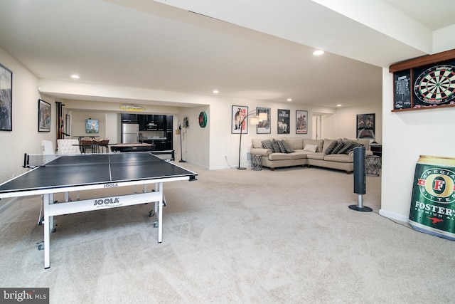 game room with light carpet