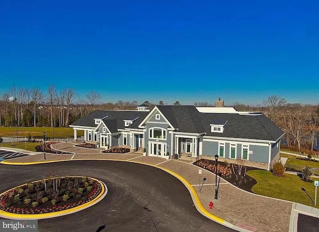 view of front of home with a front lawn