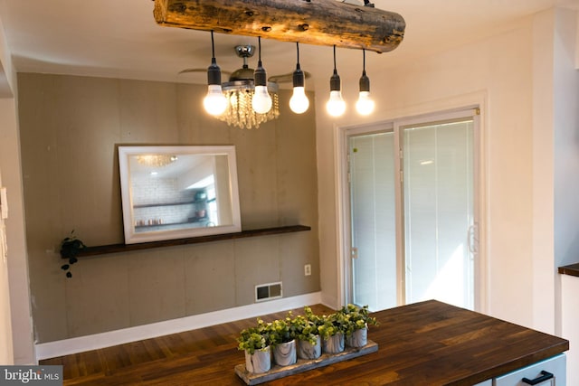 12507 Greenly St, Silver Spring, MD 20906 - unfurnished dining area featuring wood finished floors and a chandelier