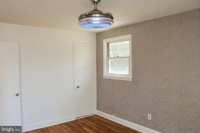 12507 Greenly St, Silver Spring, MD 20906 - spare room featuring dark wood-type flooring and baseboards