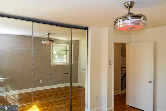 12507 Greenly St, Silver Spring, MD 20906 - unfurnished bedroom featuring wood finished floors, baseboards, and a closet