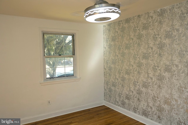 12507 Greenly St, Silver Spring, MD 20906 - spare room with baseboards and dark wood-style flooring