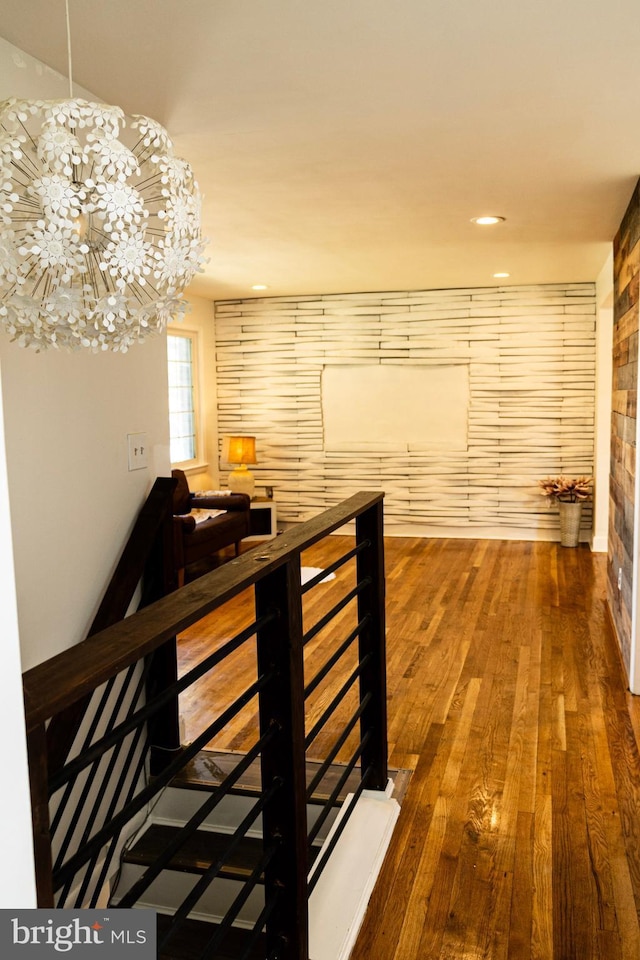 12507 Greenly St, Silver Spring, MD 20906 - corridor featuring wood-type flooring, an upstairs landing, a chandelier, and recessed lighting